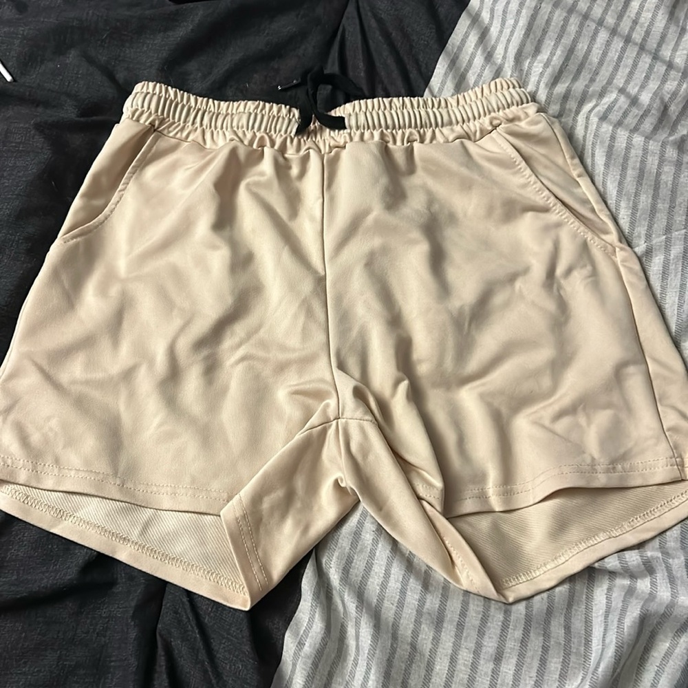 Size small light tan SHEIN shorts.